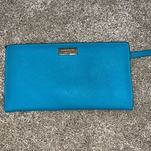 Kate Spade wallet. Small stain in coin pocket